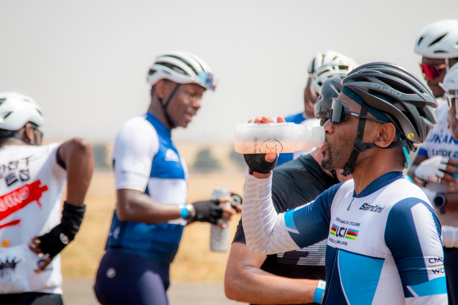rider drinking at water point