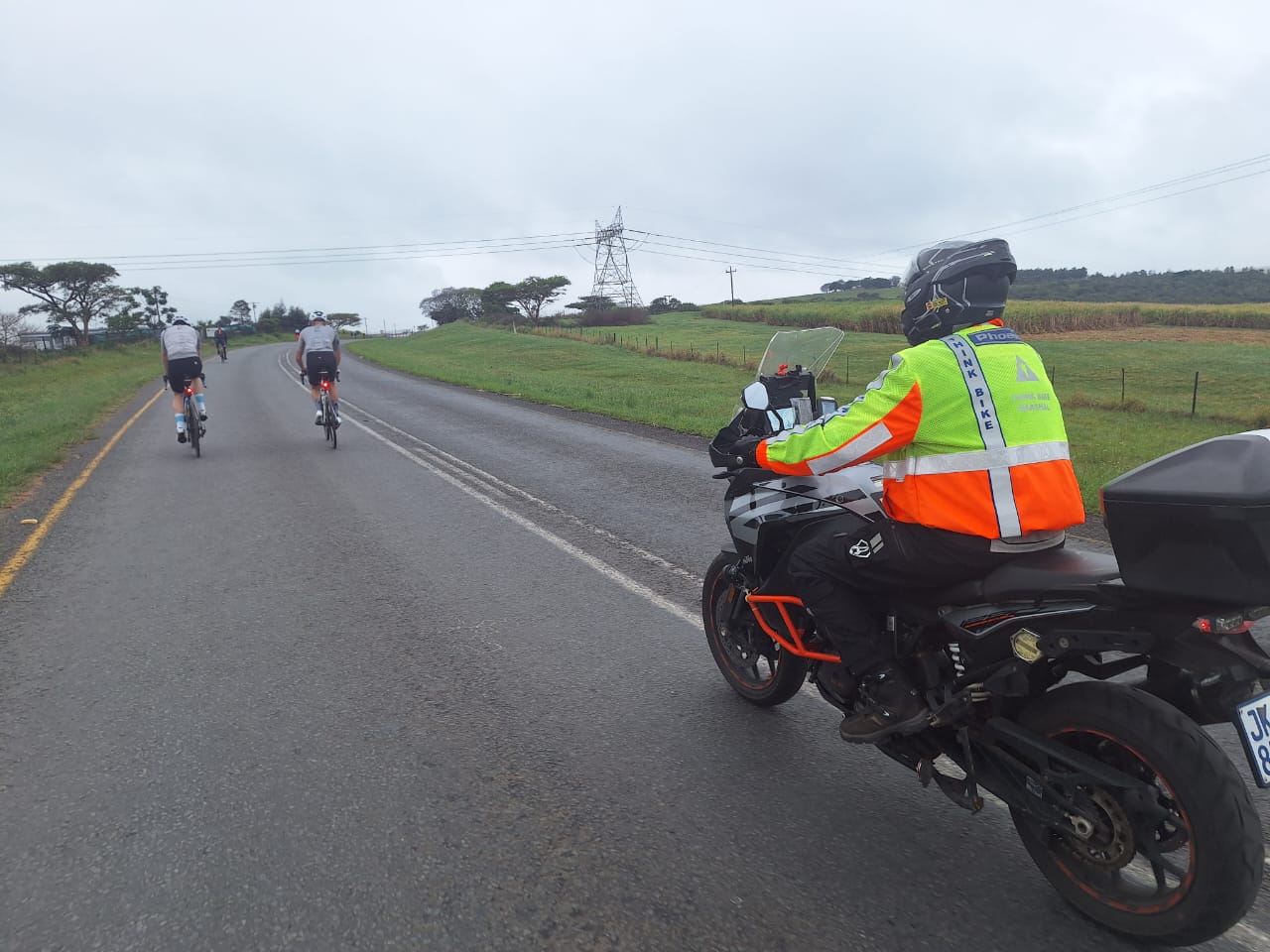 marshal with cyclists