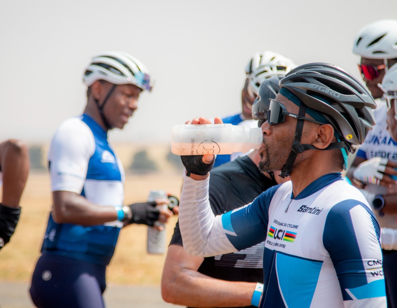 rider drinking at water point